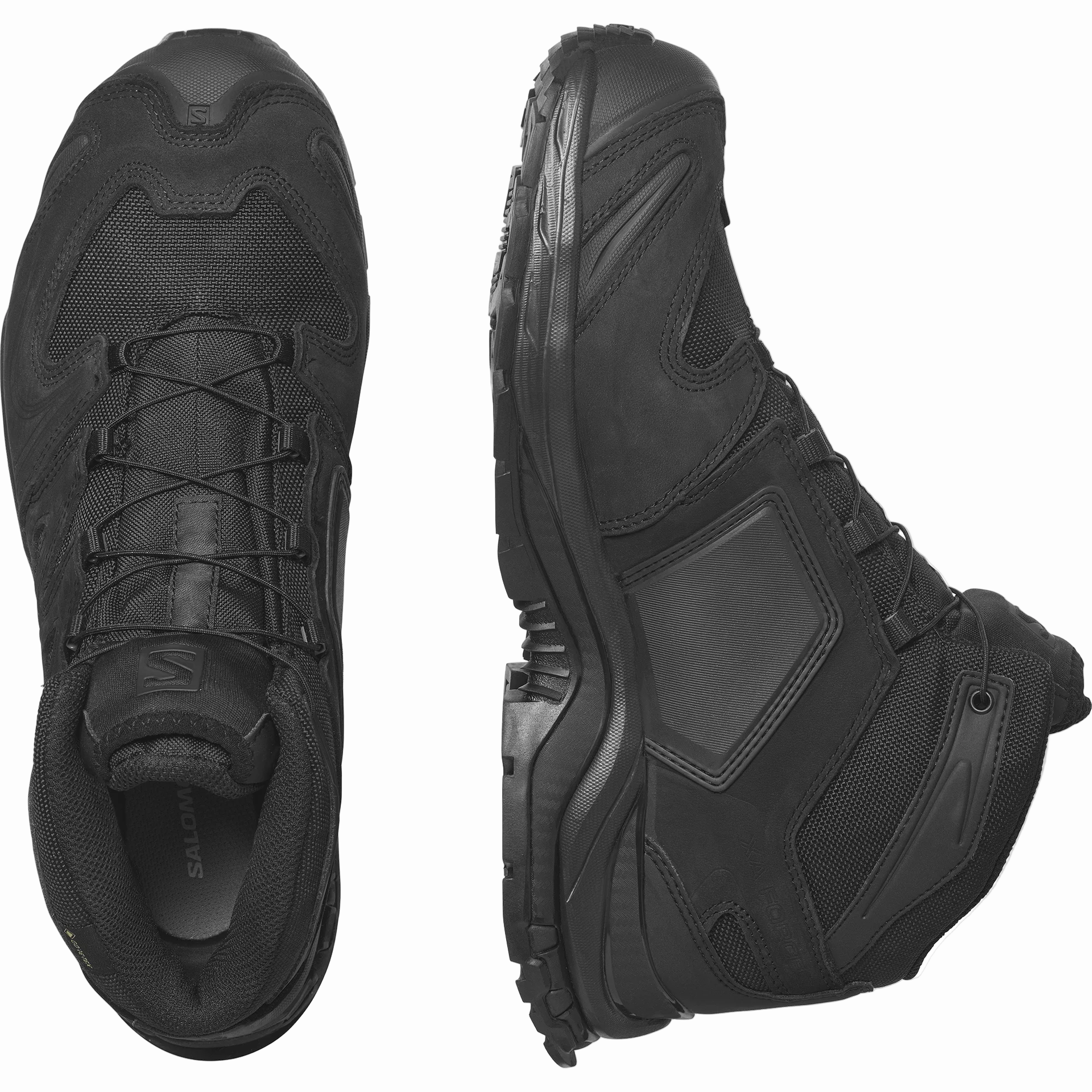 Pair of black tactical boots on a white background