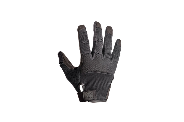 Black tactical glove on a white background