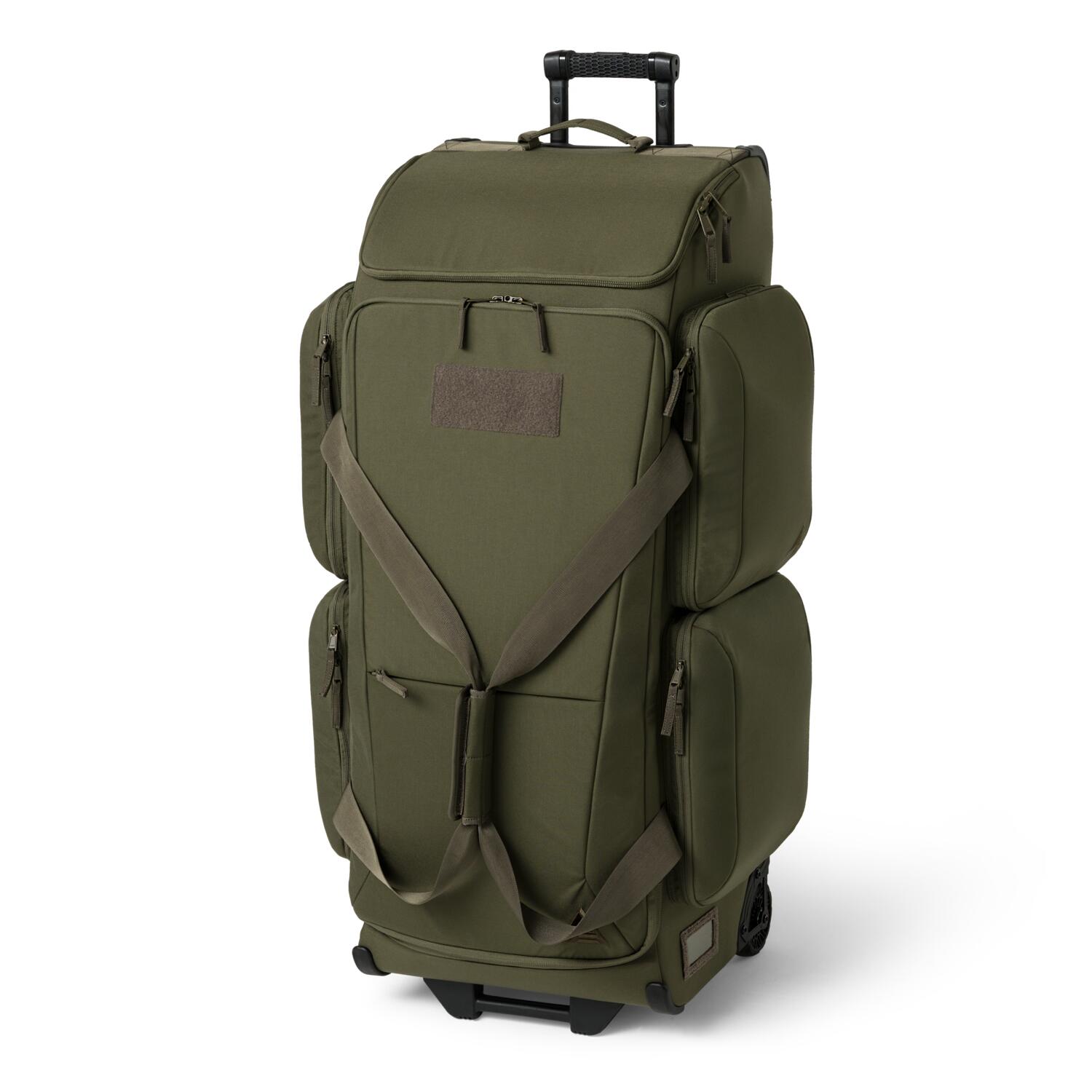 Green rolling suitcase on a white background