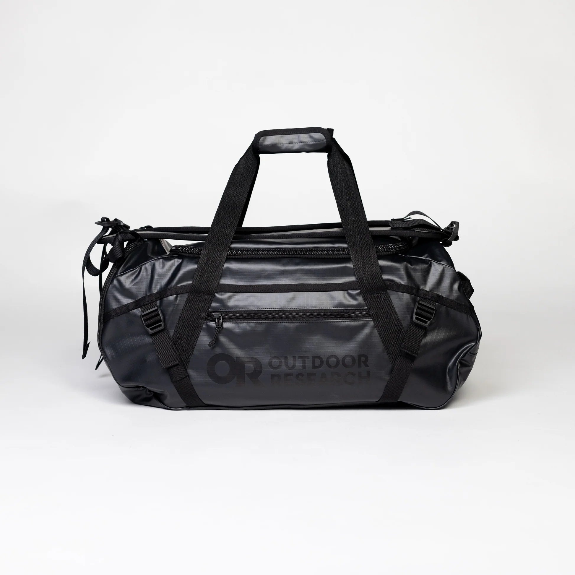 Black duffel bag with 'Outdoor' branding on a white background