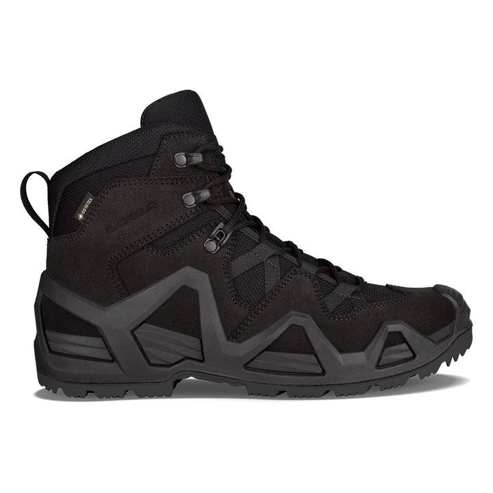 Black LOWA high-top boot with geometric design on a white background