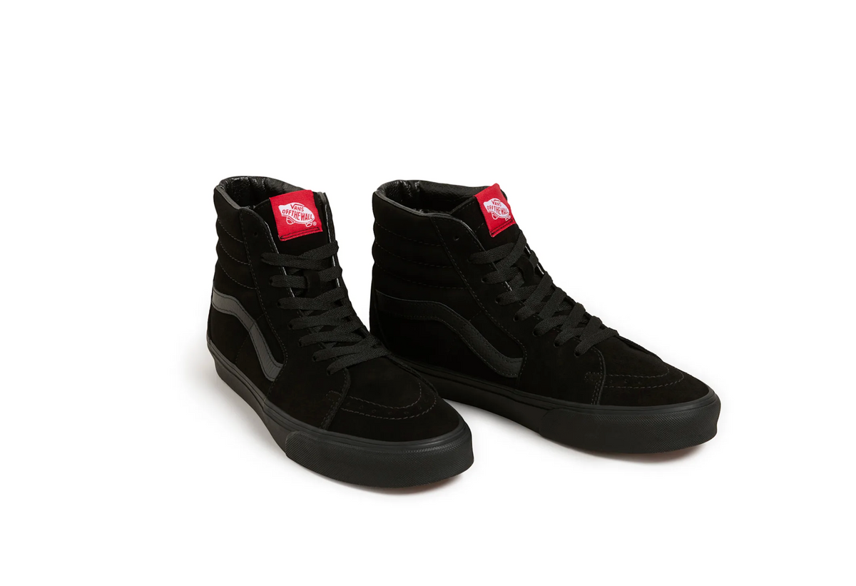 A pair of black high-top Vans sneakers with black laces, black side stripes, and signature red Vans tongue labels, displayed on a clean white background.
