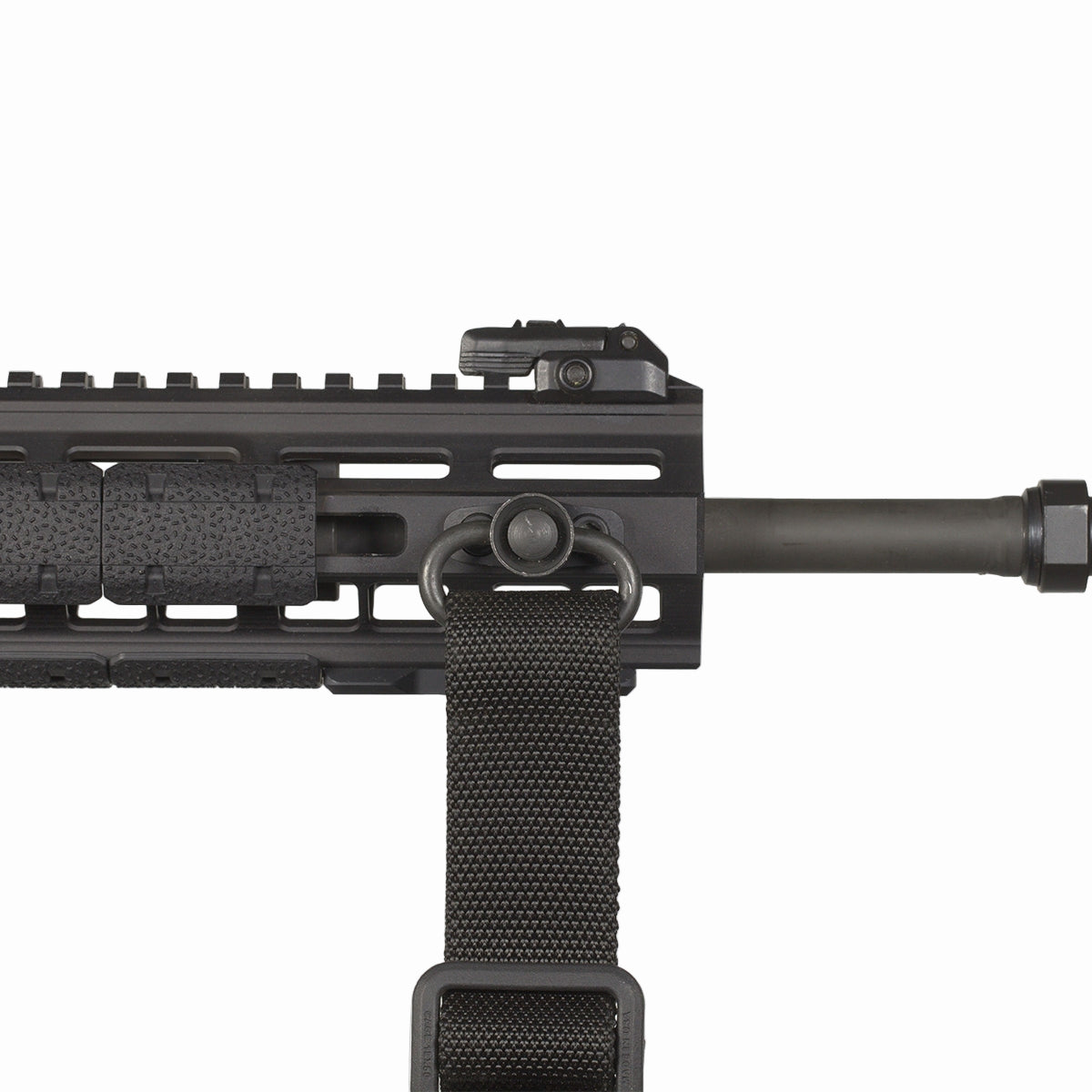 Close-up of a black rifle with a sling on a white background