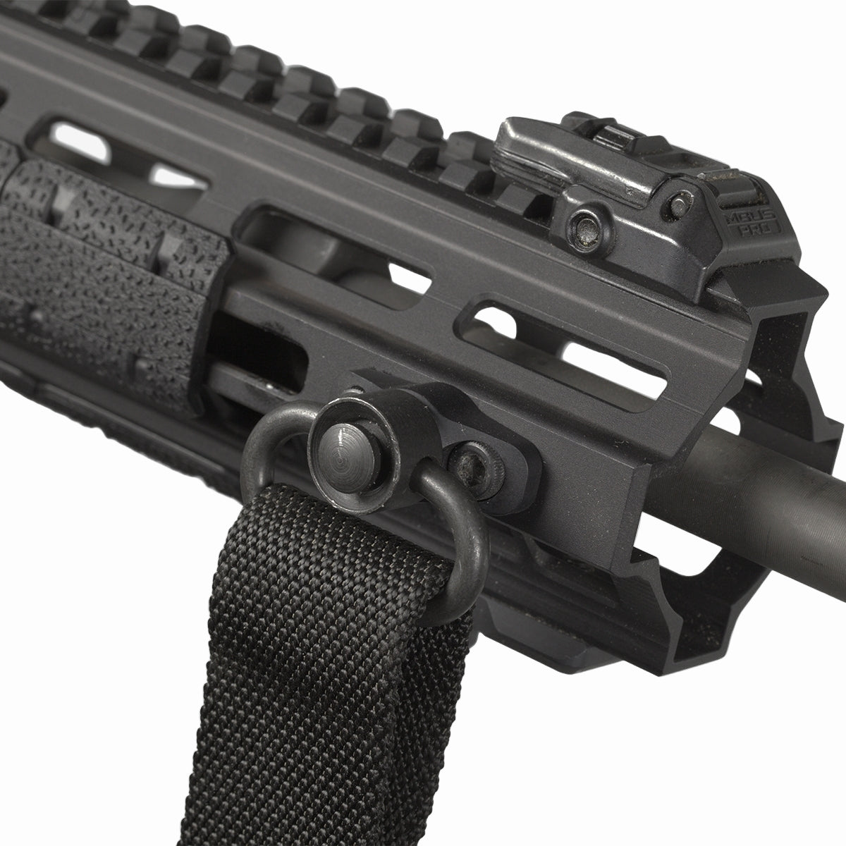Close-up of a black rifle with a sling on a white background